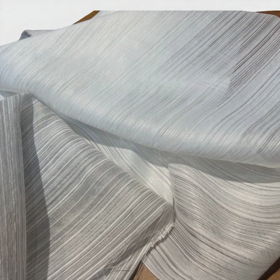 Detail texture of fire-retardant woven curtain fabric showing tight weave structure